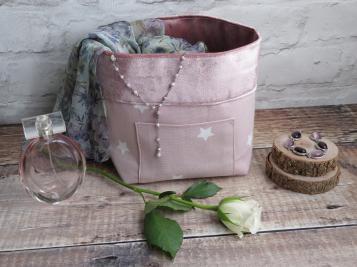 Pink velvet basket angled shot with scarf and jewellery and rose